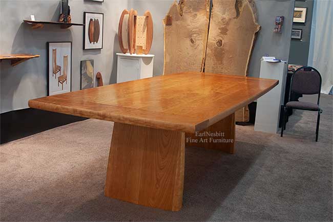 solid cherry conference table with hand fit breadboard ends from other end showing opposite leg